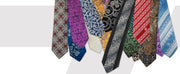 Collection of patterned neckties arranged in a fan-like display.