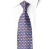 San-Dee BW23 purple and navy geometric silk necktie knotted against a white shirt, with teal accents and silver-white squares.