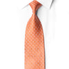 San-Dee coral peach rhinestone silk necktie worn on white dress shirt with classic knot showing square jacquard pattern