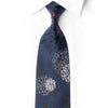 Full-length navy silk necktie with magenta and silver floral medallions and crystal rhinestones