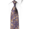 San-Dee purple silk rhinestone necktie with gold floral jacquard pattern and crystal rhinestones, worn on white dress shirt – front view