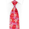Silberne Krawatte mit Mauve-Rot-Blumenmuster auf rotem Strass und Glitzer