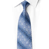 Blue silk necktie with crystal rhinestones and silver sparkles worn with a white dress shirt