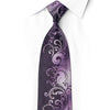 Deep purple silk necktie knotted under a white collar with lavender ornamental scrolls and crystal rhinestones